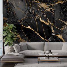 a living room with black and gold marble wallpaper, couches, coffee table and rugs