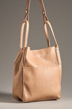 Polyurethane; polyester lining Two outer slip pockets Snap closure Imported | Faux-Leather Book Bag by Miztique, Women's, Polyester/Polyurethane at Anthropologie Fall Purses 2024, Fall Purses, Leather Book Bag, Pouch Making, Soft Leather Tote, Book Bags, Leather Book, Faux Leather Bag, Bag Ideas