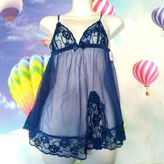 Fredericks Of Hollywood Kassia Mesh & Lace Navy Blue Babydoll Dress. Flirty Sleeveless Blue Dress, Sleeveless Blue Coquette Dress, Blue Lace Trim Coquette Dress, Sheer Blue Sleep Dresses, Blue Sheer Sleep Dresses, Sheer Blue Sleepwear For Spring, Blue Lace Sleepwear For Night, Blue Sheer Lace Sleepwear, Fitted Sheer Blue Sleepwear