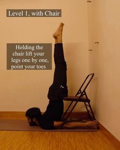 a person doing a yoga pose with their legs up in the air on a chair