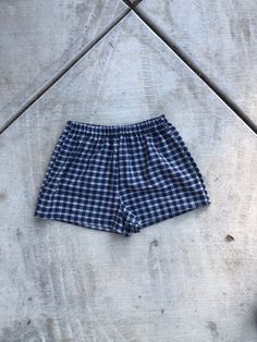 Blue Plaid Shorts. Great to wear for your next festival. Super cute summer shorts. The perfect lightweight summer time shorts.  Super cute and really comfy shorts. Made from lightweight homespun cotton with an elastic waist band.  Great gift for a birthday, holiday or even a treat for yourself. All of my shorts are made to order so if you have a special request you can leave me a note with your order telling me your exact size specifications. If you don't see your size, if you need the shorts bi Casual Blue Boxer Briefs For Beach Season, Blue Short Boxer Briefs For Beach, Beachwear Bottoms With Built-in Shorts, Cotton Beachwear Bottoms With Built-in Shorts, Blue Short Boxer Briefs For Vacation, Casual Blue Boxer Briefs For Summer, Cotton Swim Trunks With Built-in Shorts, Casual Shorts For Beach Season Festivals, Summer Cotton Boxer Briefs For Loungewear