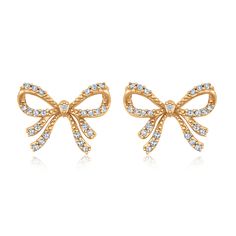 These elegant diamond bow-shaped stud earrings are crafted in radiant 10k yellow gold. These earrings each feature a delicate bow design that is adorned with sparkling round diamonds. The perfect blend of sophistication and charm, they add a touch of timeless elegance to any look, ideal for both everyday wear and special occasions. The diamonds are 1/6ctw, I in color, and I2 in clarity. These earrings measure 9.8mm in length and 12.7mm in width. Yellow Gold Stud Earrings, Diamond Bows, Gold Stud Earrings, Bow Earrings, Bow Design, Gold Stud, Gold Studs, Gold Earrings Studs, Sales Gifts