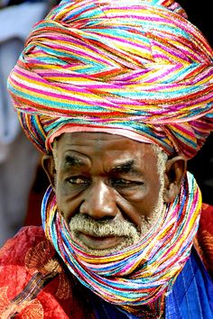 a man with a colorful turban on his head