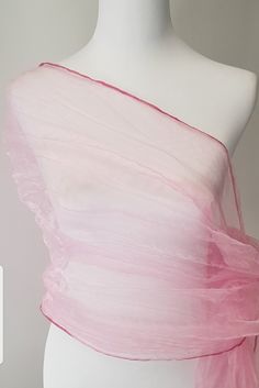 Pink Shawl in organza silk material with a shimmery shine.  Pink Scarf, pink wrap. To achieve the crinkled / crushed look the shawl is twisted whilst wet and tied with a rope and left to dry. Beautiful shawl, will make any outfit look glamorous.  Keep it or gift it.  Care Instructions Hand wash mild detergent Hang to dry naturally  Crush will remain as long as you don't iron. If you want to remove the crush affect on shawl just iron with cloth on top.  Plz note, once ironed the crush affect will Fitted Pink Organza Tulle Fabric, Pink Organza Dupatta For Wedding, Pink Silk Dupatta For Party, Pink Dupatta For Spring Wedding, Pink Wedding Dupatta For Spring, Pink Organza Dupatta For Party, Fitted Pink Tulle Fabric For Wedding, Pink Organza Tulle Fabric For Spring, Pink Tulle Fabric For Summer Wedding