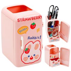 a pink toy refrigerator with scissors and other items in the compartment, including pens and pencils