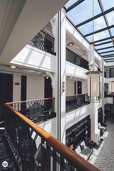 the inside of a building with several balconies