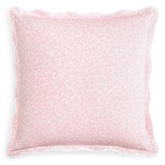 a pink pillow on a white background