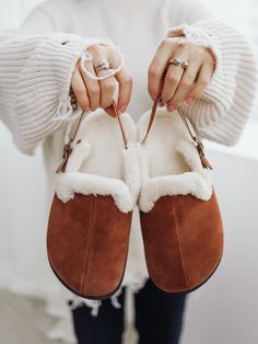 Step into comfort with our cozy sheepskin suede clogs, the perfect outdoor mules for chilly days. These warm slippers feature luxurious fur lining, making them ideal for winter wear. Designed for both style and practicality, these cute women's shoes are a thoughtful gift for her. Enjoy the perfect blend of warmth and fashion with every step! Material: high-quality soft suede leather and fur Size: EU 36-41 / US 5.5 - 10 Estimated shipping time: Europe 7-14 days US 7-14 days Asia 7-20 days Other country 7-21 days See more great shoes in our store : https://www.etsy.com/shop/MxBrandUA?ref=seller-platform-mcnav Winter Suede Clogs With Textured Footbed, Winter Suede Slippers With Cushioned Footbed, Suede Slippers With Plush Lining And Round Toe, Cozy Slip-on Clogs With Textured Footbed, Winter Suede Mules With Rubber Sole, Winter Sheepskin Slip-on Slippers, Fall Comfortable Flat Heel Mules, Winter Slip-on Closed Toe Slippers, Slip-on Closed Toe Winter Slippers