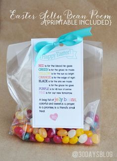 a bag filled with jelly beans next to a sign that says, happy easter bunny