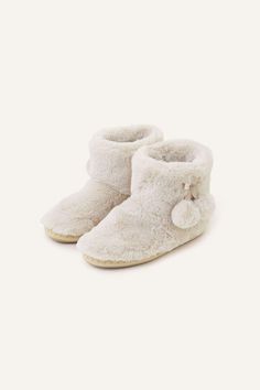 Toasty toes, always. Keeping your feet warm and your loungewear looking luxe, this pretty pair has a boot silhouette with pom-pom detailing. Perfect for nights in. Boots Cream, Boot Silhouette, Pom Pom Slippers, Slippers Boots, Sequin Outfit, Soft Slippers, Faux Fur Pom Pom, Fur Pom Pom, Jogger Jeans