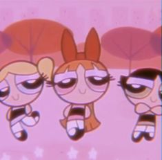 the powerpuff girls are standing together in front of some trees and stars, with their eyes closed