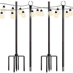 four black poles with lights hanging from them