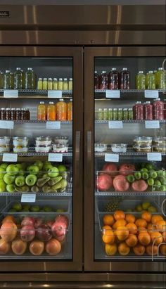 the display case is full of fresh fruits and vegetables