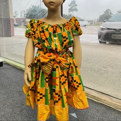 African Clothing For Children Ankara Kente Off Shoulder Top Elastic Waist Skirt And Head Band Made With Poly Cotton Fabrics Contact Me For Questions About This Items Playful Orange Short Sleeve Dress, Playful Orange Cotton Dress, Fitted Orange Playwear Sets, Simple Ankara Gowns, Girl Silk Dress, Nigerian Outfits, Tulle Party Dress, Shrug For Dresses, Orange Floral Dress