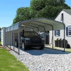 a truck is parked in front of a house with a carport attached to it