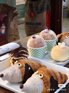 pastries with eyes and noses are on display