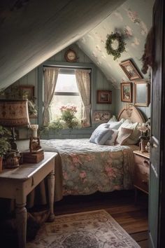 an attic bedroom with a bed, desk and window in it's roof dormer