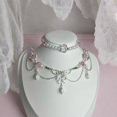 A Cute elegant Royal coquettecore style necklace with pink elements,  includes a bow held up by angel wings as its cenetral charm, and pink and white pearls and glass beads. This necklace was handmade and designed by myself ˏ˚ ༘♡ ⋆｡˚ This necklace will serve as a perfect gift for a freind. Or even better, a perfect gift for you! Your order wil include a clear ziplock storage bag for your necklace and instructions on how to care for your new jewellery. ˏˋo Includes: ✩Necklace  ✩Bracelet The defau Esty Shop.com Jewellery, Angelic Accessories, Pearl Coquette, Pearl Bow Necklace, Pearl Core, Coquette Necklace, Pink Elements, Pearl Jewlery, Bracelets With Charms