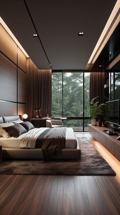 a modern bedroom with wood floors and large windows overlooking the trees in the forest is lit by lights