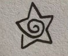 a black and white drawing of a star