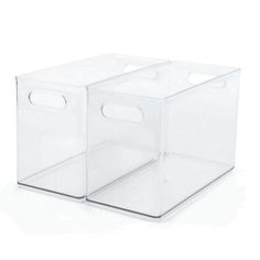 two clear storage bins sitting side by side