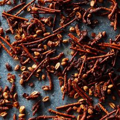 nuts and raisins are scattered on a table