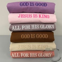 four folded towels with the words jesus is king and all for his glory on them