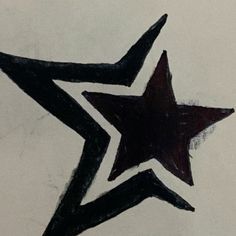 a black and white drawing of a star