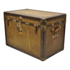 Antique Belber Traveling Goods Monogram Louis Style Hard Case Steamer Trunk. Item features a unique geometric monogram print throughout similar to LV, metal hardware, leather handles, lift out insert, original label, working lock and key, very nice antique item, quality American craftsmanship. Circa Early 20th Century. Measurements: 22.5" H x 32.5" W x 20.25" D. Trunk Boxes, Leather Trunk, Travel Trunk, Steamer Trunk, Leather Frames, Bespoke Interiors, Game Ideas, Monogram Prints, Lock And Key