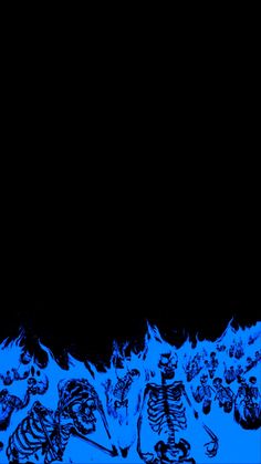 a group of skeletons sitting in the middle of a blue flamed area with black background