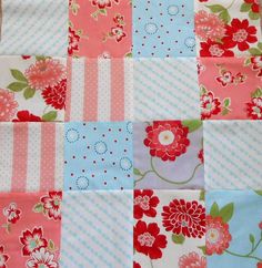 a patchwork quilt with flowers on it