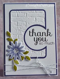 a thank you card with a flower on the front and bottom, which says so much