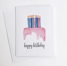 a birthday card with candles on top of it