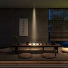 a modern kitchen is lit up at night