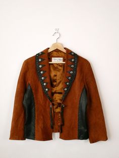 Vintage Women's Southwestern Brown Suede/Leather Trim Jacket from 80s. Measurements Length: 21 1/2" Armpit to armpit: 19 1/2" Shoulder: 17" Shoulder to end of sleeve: 21" Condition: Gently used. There's a tiny snag on back, stain on sleeve. One stud is missing as shown in the photos.  ※Please read the policy before you purchase※ 80s Shorts, 70s Party, Trim Jacket, Womens Jackets, Suede Jacket, Brown Suede, Leather Trim, Leather Trims, Suede Leather