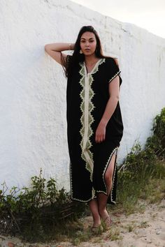 This Boho Kaftan Caftan is so cozy, it's definately idea for wearing during the weekend, or when you just want to relax at home. Although this caftan is really cozy, because the style is so elegant, it could be worn for an exotic night in, or when you want to wow your friends at your home party. Or wear it outdoors with boots, and look super bohemian! I live in London and in Marrakech. While I am in London, I always miss the exotic atmosphere of Marrakech. That's when I just bring out my comfy t V-neck Kaftan Dress For Beach, Summer V-neck Thobe For Beach Cover-up, Black Long Kaftan For Beach Season, Long Black Kaftan For Beach Season, Free Size Maxi Thobe For Beach, Beach Thobe In Free Size Maxi Length, Free-size Maxi Thobe For Beach, Traditional Black Summer Dress, Holiday Tunic Dress For Beach Season