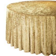 a round gold tablecloth on a white background