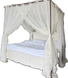 the canopy bed is made up with white sheets and drapes on it's sides