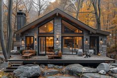 a small cabin in the woods surrounded by rocks