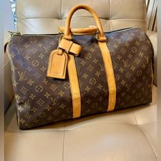 Authentic Louis Vuitton Cabin Friendly Keepall Size 45. Monogram Canvas With Vachetta Leather Handles. Beautiful Vintage Piece. Comes With Its Lock And Keys, Name Tag And Handle Holder. Made In France. Bags Louis Vuitton, Leather Handles, Louis Vuitton Bags, Authentic Louis Vuitton, Monogram Canvas, Leather Handle, Travel Bags, Travel Bag, Louis Vuitton Monogram