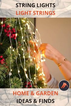 a woman is decorating a christmas tree with red and white lights on the branches