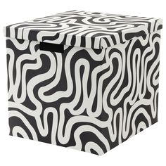 a black and white box with wavy designs on it