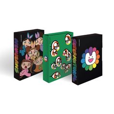 three different colored boxes with cartoon characters on them