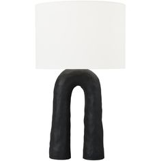 a black lamp with a white shade on it