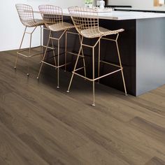 Shaw - Pantheon HD Plus LVP 7 in. x 48 in. - Fiano Pantheon HD Plus combines various species, hues, and embossed-in-register textures to create a timeless look with modern design elements. Its wire brushed oak visuals, high color contrast, and mixed-width planks make it easy to install. This flooring also boasts an Armourbead® wear layer for improved durability and a Soft Silence® acoustical pad for reduced noise and maximum comfort. Specifications: Collection: Floorte Size: 7"W x 48"L Wear Layer: 20mm Finish: ArmourBead® 18.91 sq. ft. per carton Installation: Glue, Float Edges: Accent Bevel Installation Location: Above, Below, On Shaw Flooring, Vinyl Style, Luxury Vinyl Tile Flooring, Shaw Floors, Vinyl Tile Flooring, Oak Planks, Durable Flooring, Luxury Vinyl Tile, Luxury Vinyl Flooring