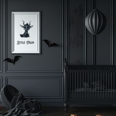 a baby crib in a dark room with bats on the wall and a framed poster above it