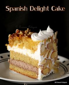 a piece of cake on a plate with the words spanish delight cake in front of it