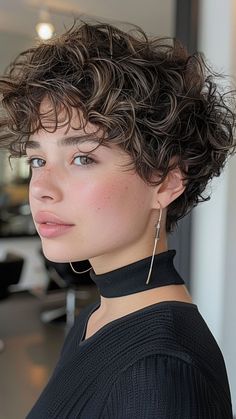 24 Curly Hairstyles for Round Faces to Rock Your Look Pixie Haircut For Round Faces Curly, Asymmetrical Pixie Curly, Short Curly Hair On Round Faces, Extremely Short Curly Hair, Short Curly Haircuts For Oval Faces, Long Pixie Curly Hair, Short Curly Hair Cuts For Round Faces, Curly Pixie Cuts Round Face Curls, Curly Pixie Haircut For Chubby Faces