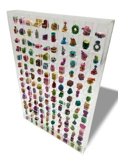 a display case filled with lots of different types of toys on it's sides