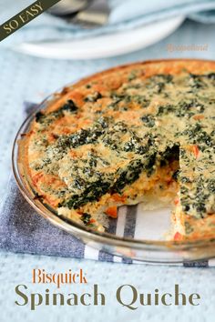 a spinach quiche is shown on a plate